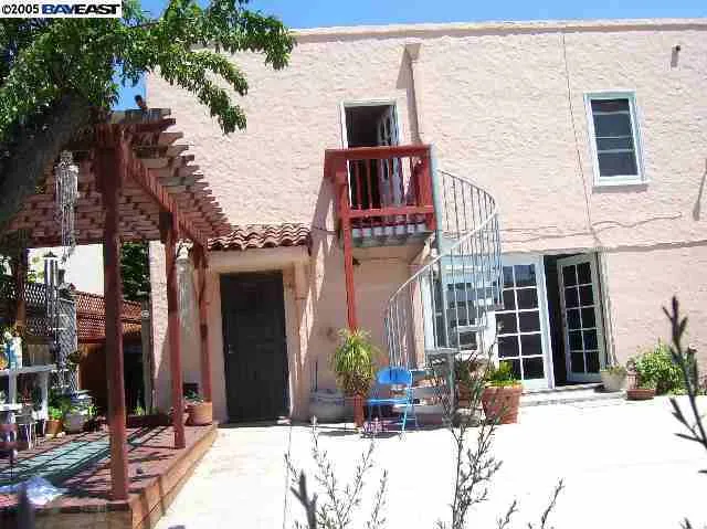 Back Yard Stairs Lead to Bedroom