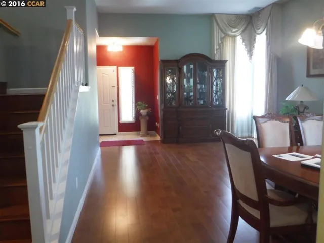 The gleaming hardwood floor is only 3 years new
