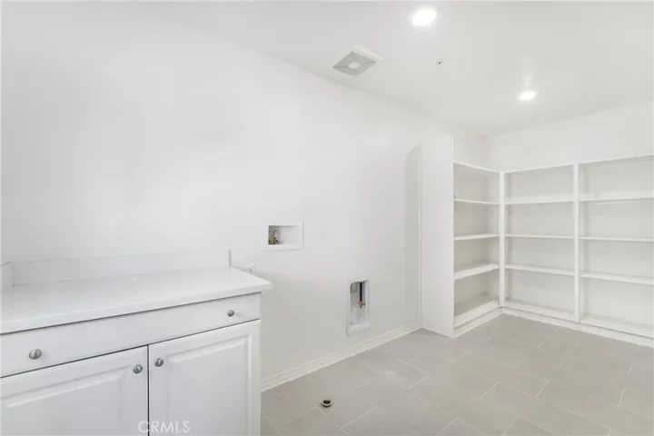 Spacious, highly functional UPSTAIRS laundry room!