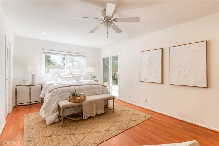 Primary suite with view of the backyard~