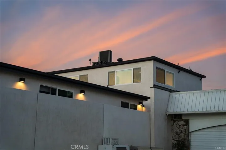 The 2 bedroom is the back unit, stand alone above garage