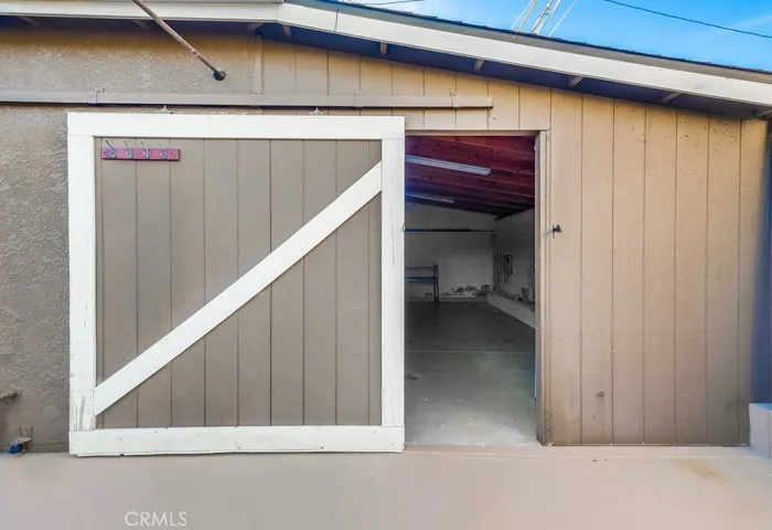 Bonus storage room behind garage