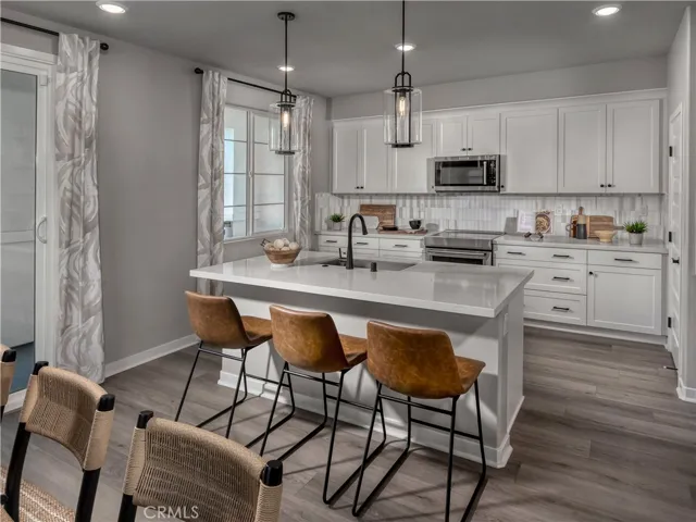 Photo is not of the actual home, but is an inspirational photo of builder’s model home and may depict options, furnishings, and/or decorator features that are not included