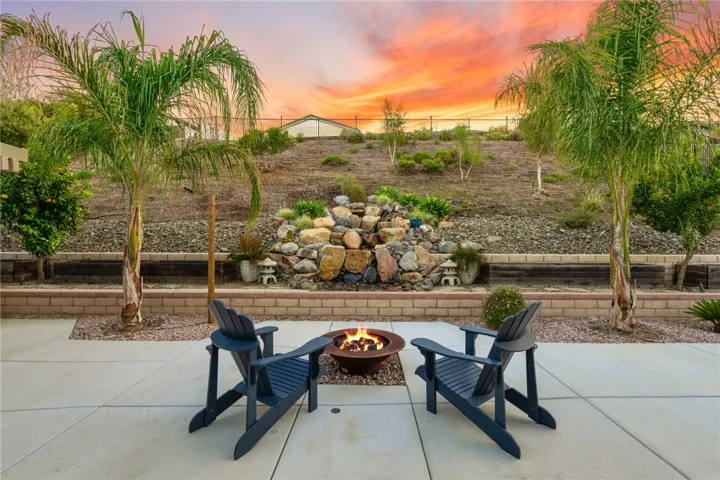 Waterfall and firepit feature