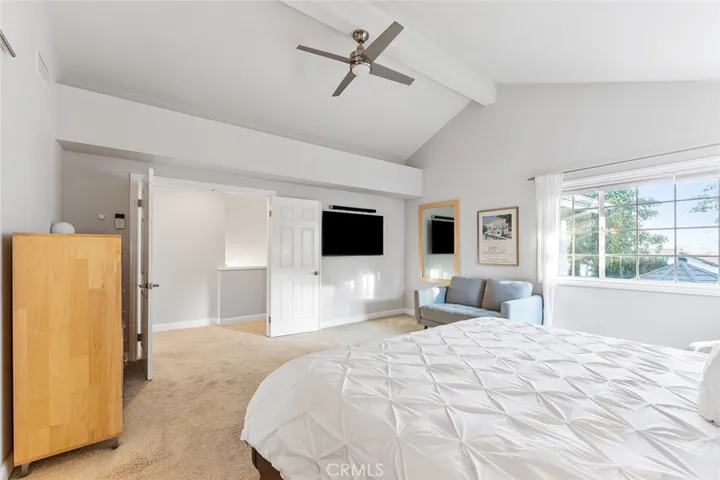 Primary bedroom with high ceilings