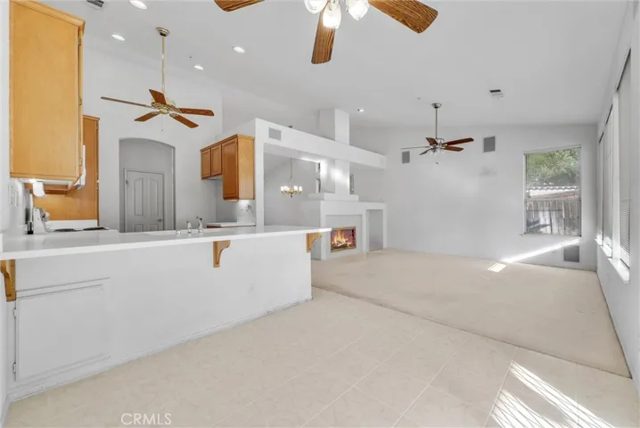 Family dining area with kitchen and family room.