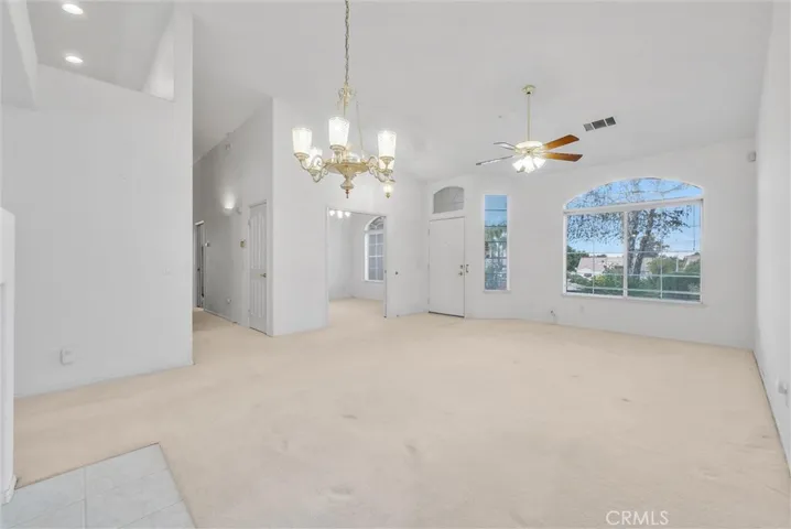 Formal dining area, living room and den.