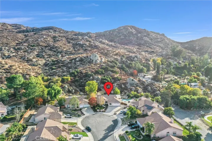 Aerial picture of home and nearby homes.  Home located at the top of Jones St. on the cul-de-sac.