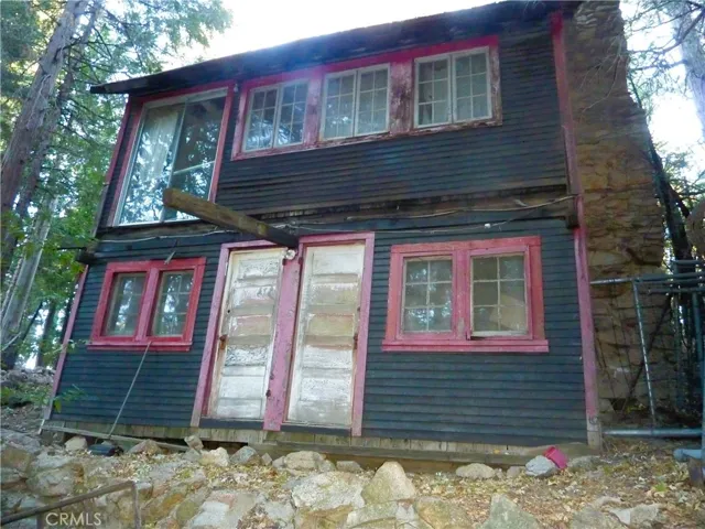 The front of the cabin gives you a sense of its age and makes it a wonderful project to bring it back to its charm of yesteryear.