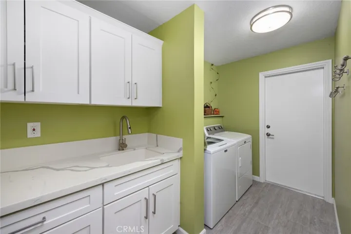 Remodeled Laundry Area with Sink