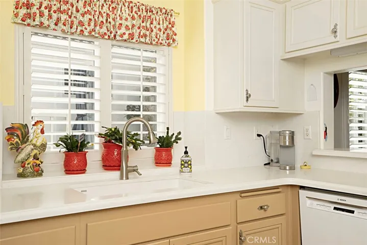 Sunny window over farm house sink