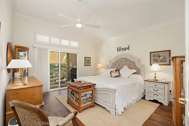 Primary bedroom with slider to patio