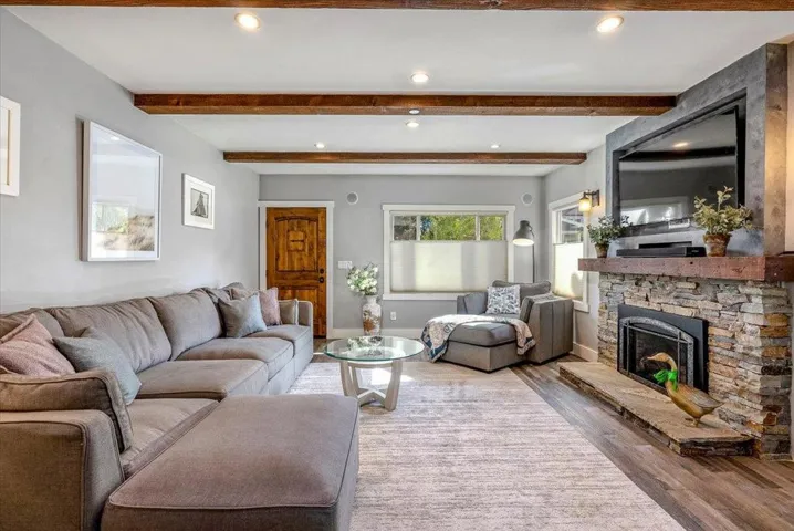 Front door, fireplace--living room