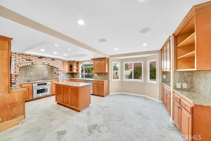 Upgraded kitchen with KitchenAid and LG appliances.