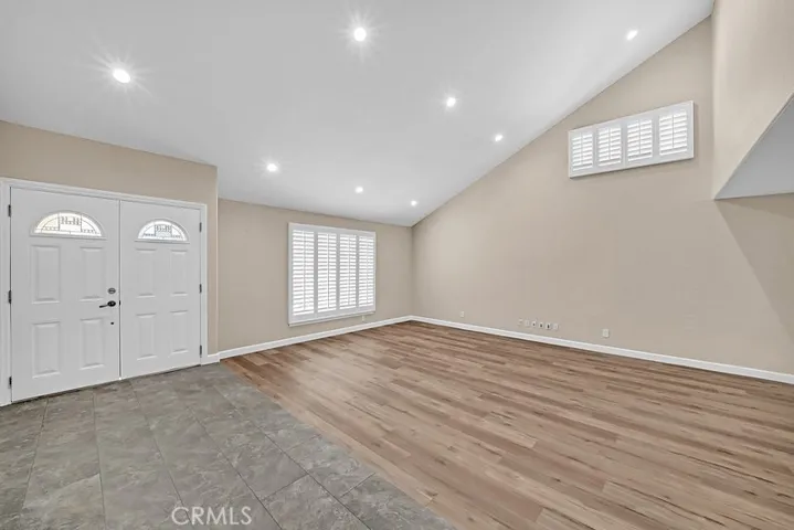 Experience vaulted ceilings upon entering the home.