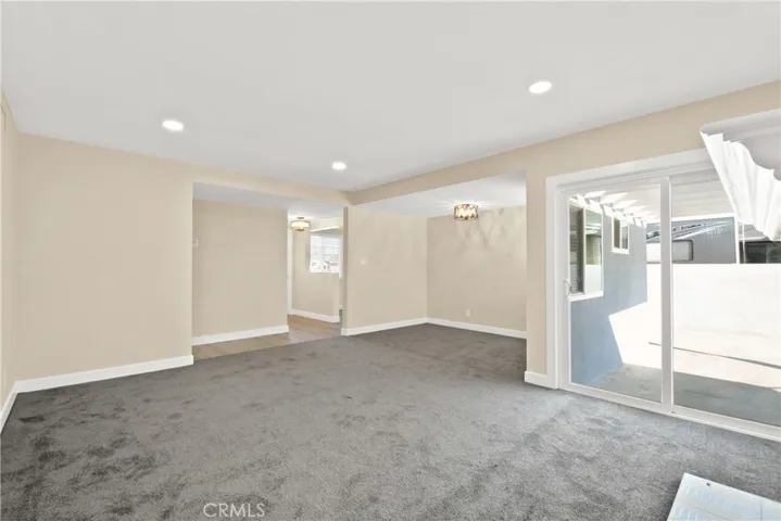 Living/dining room combo with Glass door.