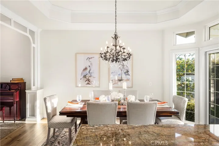 Let there be light!!! floor to ceiling windows and glass door letting natural light in.