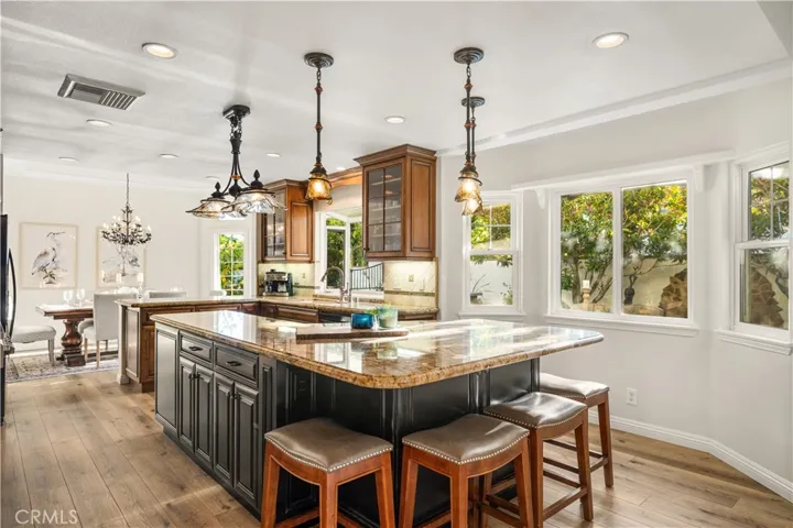 in kitchen sitting in this large island.