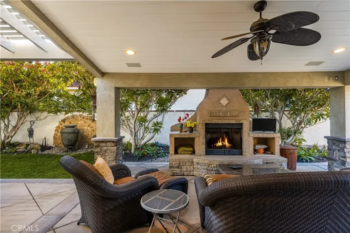 Imagine yourself enjoying a book year round under this covered patio.