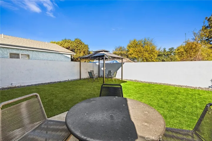 Green Turf in front of& back yard.