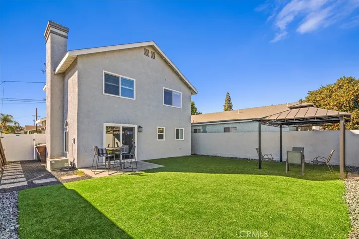 Green Turf in front of& back yard.