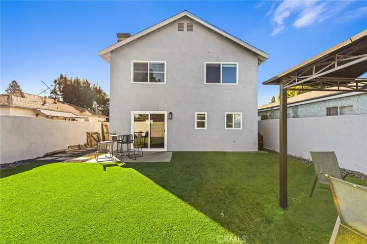 Green Turf in front of& back yard.