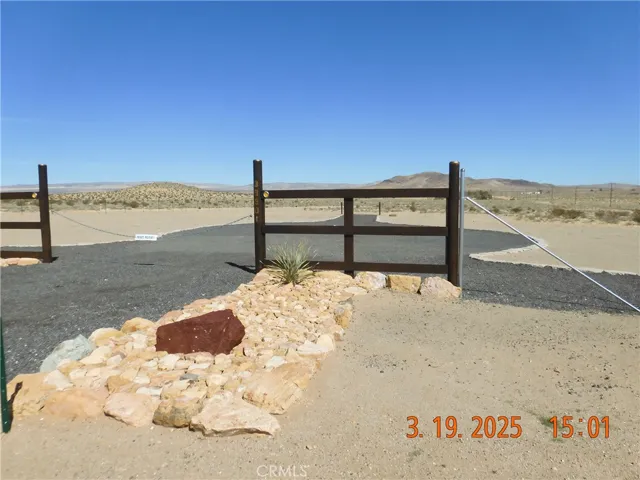 There is also a beautifully landscaped entrance to the property.  This photo taken from Hinkley Rd, looking east.