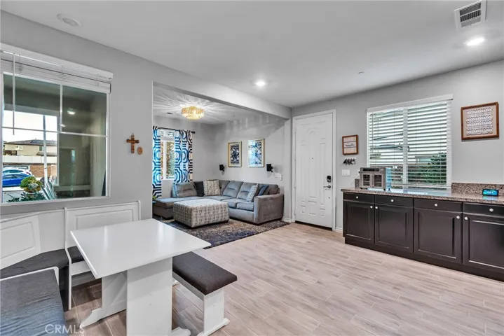 Kitchen dining area and family room to downstairs unit