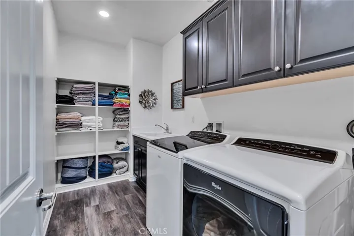 Upstairs additional laundry room and storage