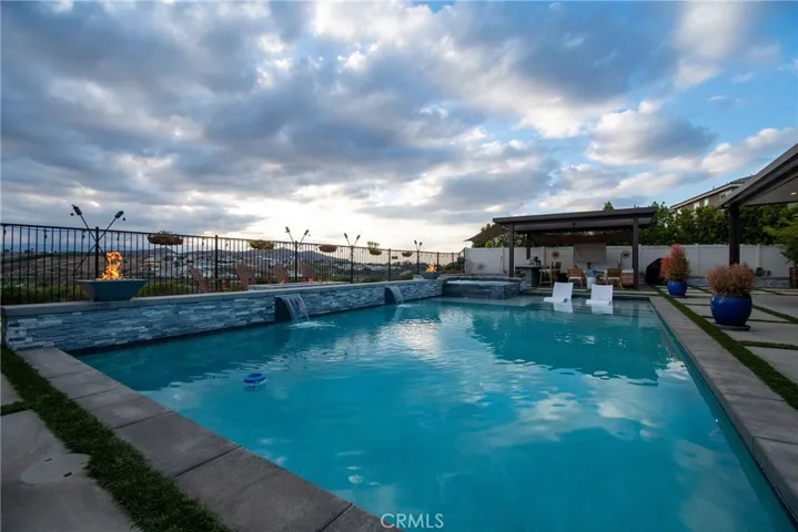 Pool spa firepits waterfal views unobstructed forever mountain views at sunset