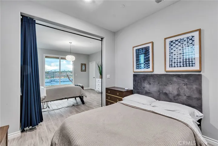 Downstairs Bonus room or 2nd bedroom looks out to pool patio area private entrance