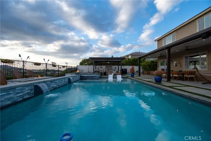 Ppool spa fire pit in sunset