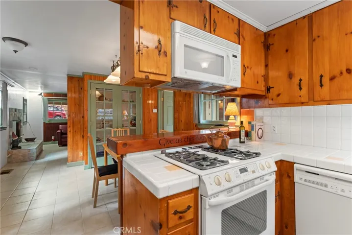 Kitchen opens to dining room and living room.