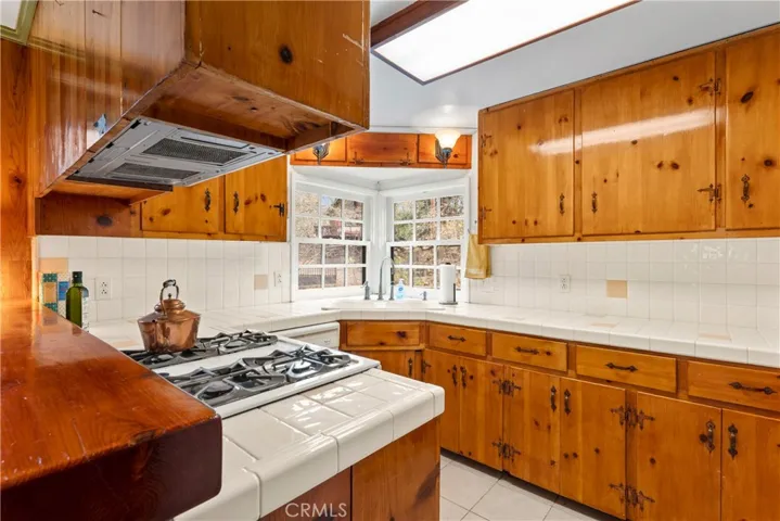 Kitchen with lots of cabinets and counter space.