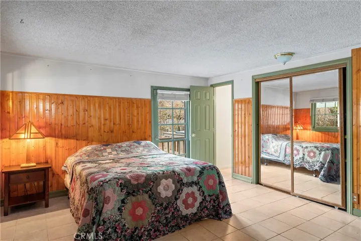 Main level bedroom with two closets.