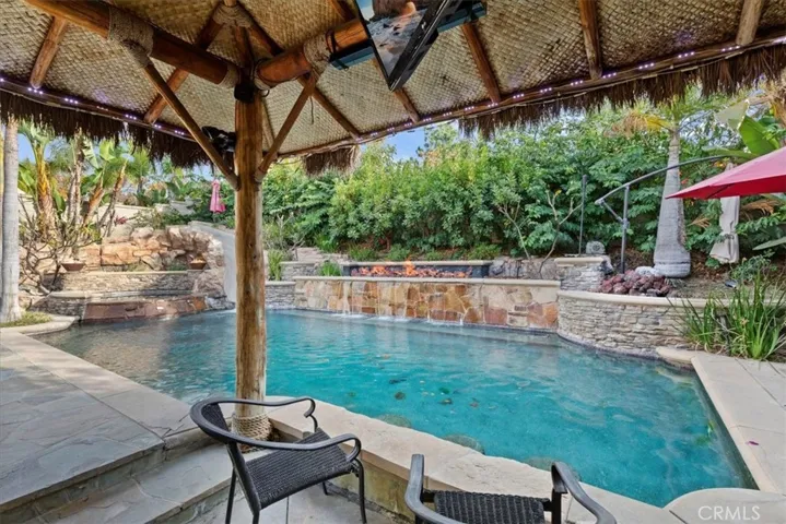 Pool Waterslide, Spa,  Waterfall, Firebed & Palapa
