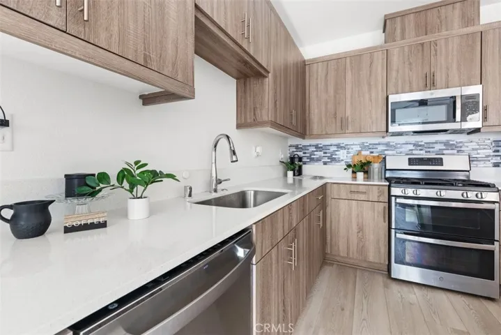 This home is packed with advanced energy-saving features and modern technology, such as a right-sized energy-efficient HVAC system with sealed ducts to reduce energy use and a tankless water heater for lower operating costs.