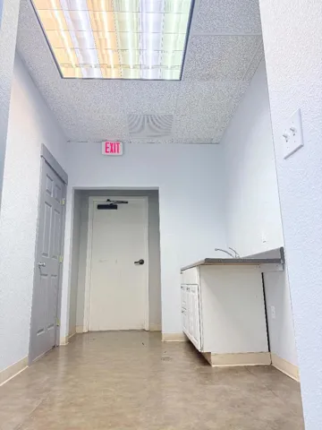Breakroom, Sink, Small Office inside Downstairs Unit #1