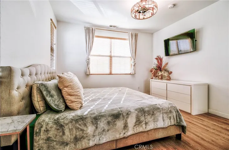 Primary bedroom with plenty of windows