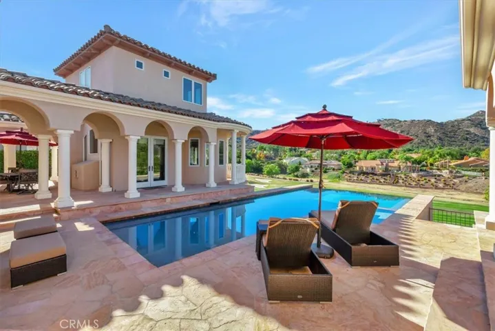View from the primary suite overlooking pool and golf​​‌​​​​‌​​‌‌​​‌​​​‌‌​​​‌​​‌‌​​‌‌​​‌‌​​​​ course.