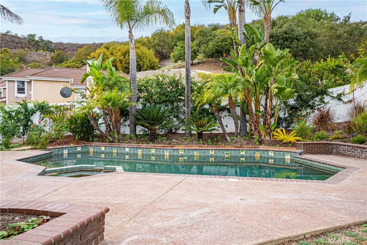 The large swimming pool is a highlight of this gorgeous home.