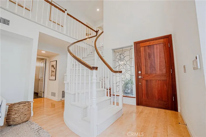 Staircase to the second bedroom level.