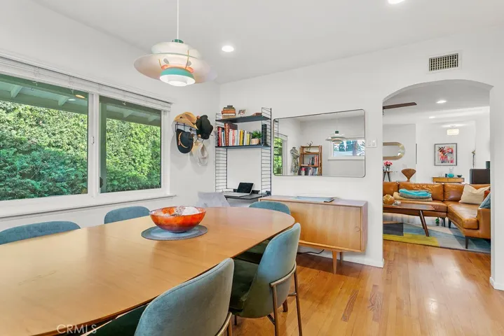 Dedicated dining room between kitchen and living room.  Could make a great den or home office too.
