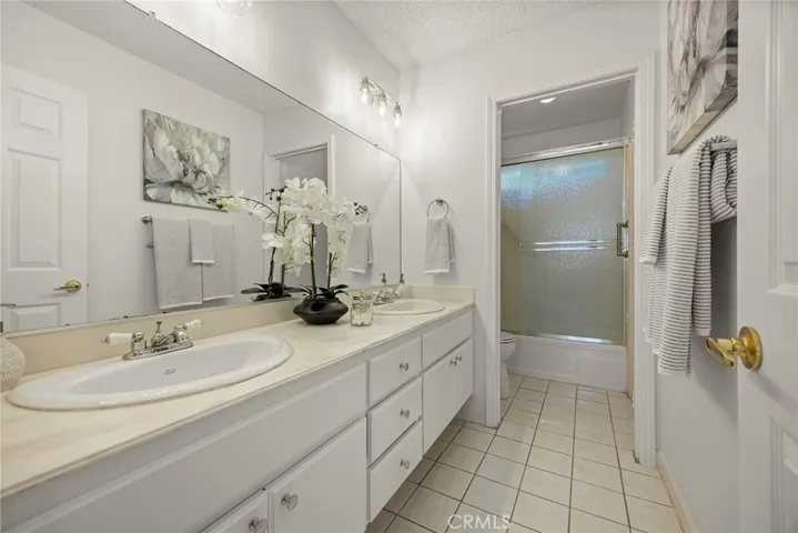 Upstairs Hall Bath with Private Shower/Tub Room.