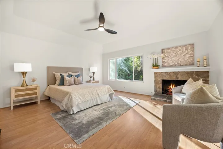 Primary Bedroom with Fireplace - High Ceiling.
