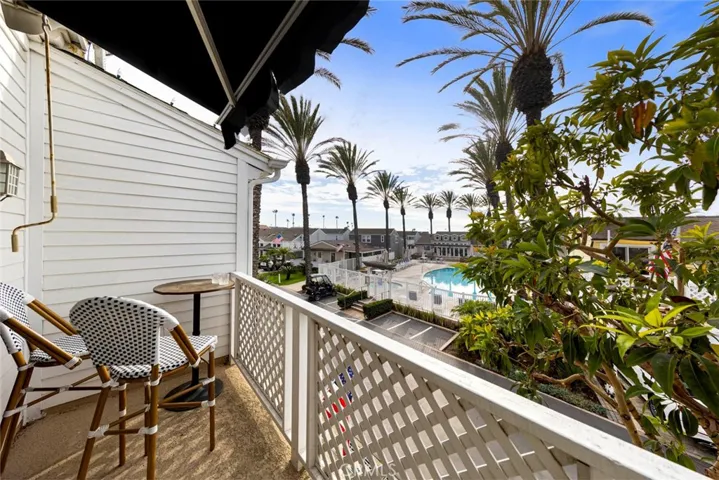 Master bedroom balcony overlooking the pool