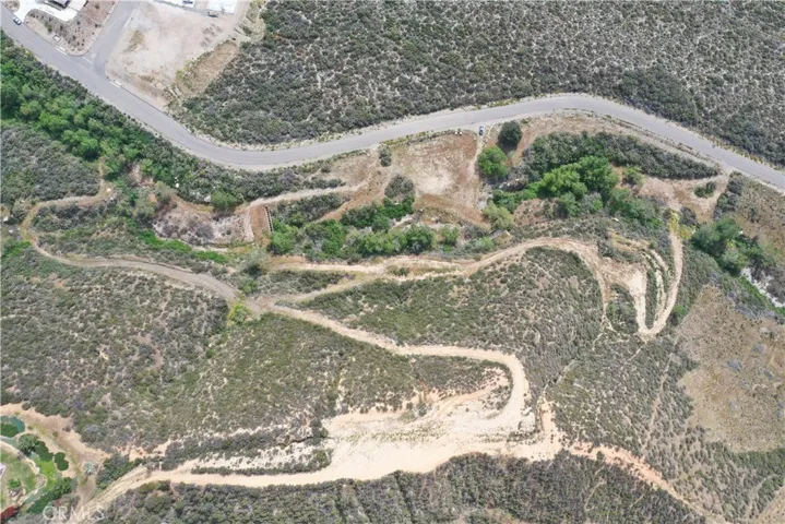 Looking at entire property. Dirt roads throughout property.  Deercrest Drive is the street.