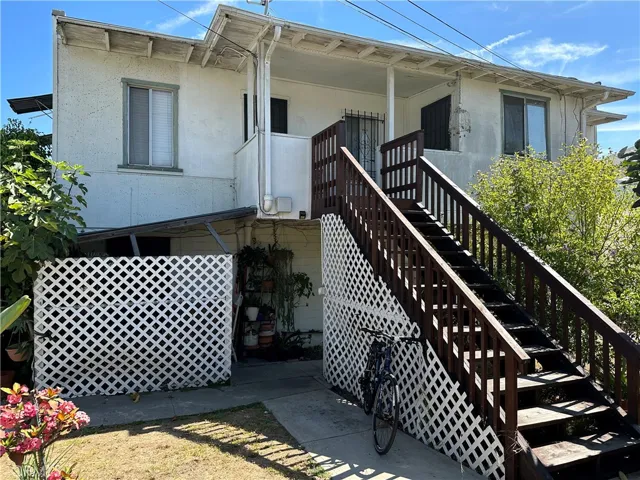 middle building - 1 garage conversion - 2 studios - and 1, one bedroom unit