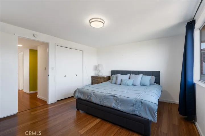 This magnificent primary bedroom offers two closets. This picture shows one of them.