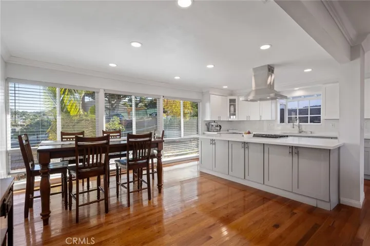 The kitchen seamlessly integrates with the living  and dining areas.